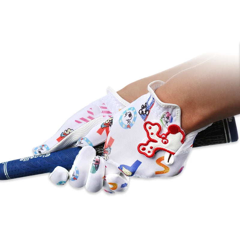 Child wearing Puppy Paws junior golf gloves on both hands - breathable fabric keeps little hands comfortable