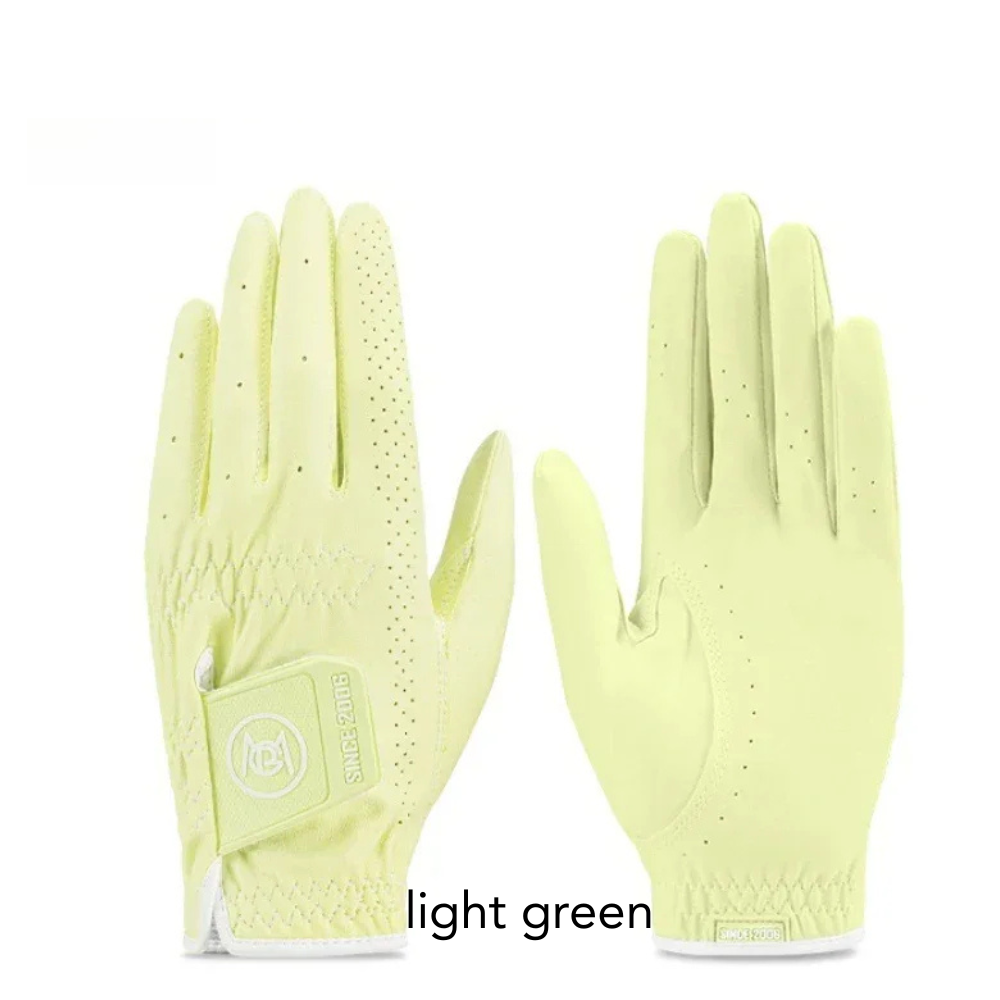 Pair of light green PGM women's golf  showing breathable holes and comfortable fit