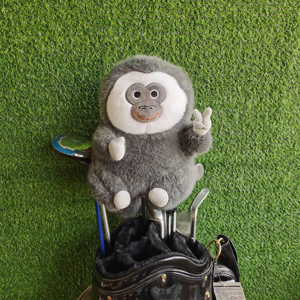 Smiling fuzzy monkey driver head cover with peace sign – plush golf club protector