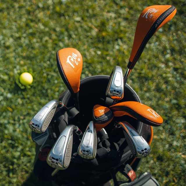 Golf Bag w/ clubs orange head covers 